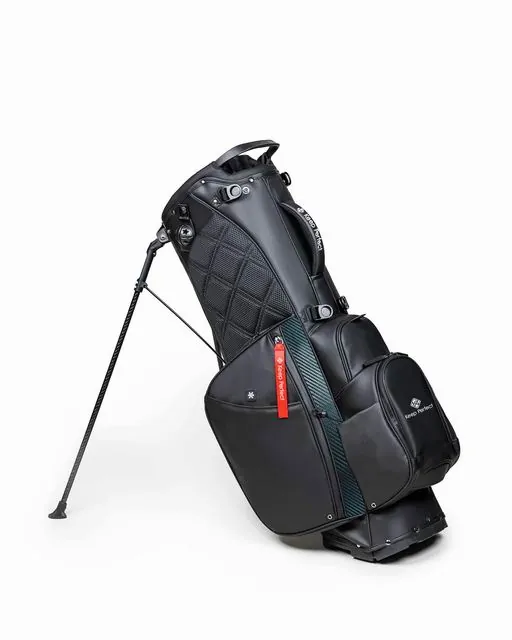 Cleaning a golf stand bag zipper and panels with a soft damp cloth